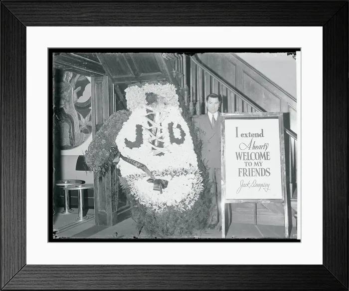 Framed Print : Jack Dempsey Standing Next to a Large Wreath Framed Print : Jack Dempsey Standing Next to a Large Wreath