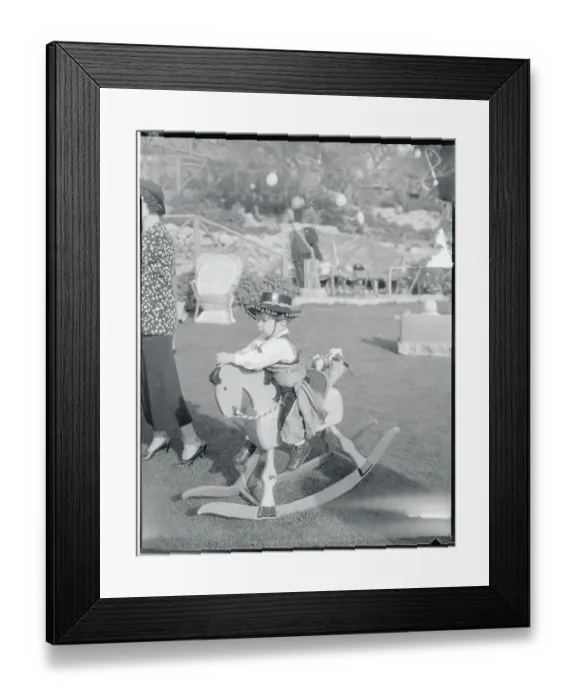 Framed Print : Mannie Robinson Riding a Rocking Horse Framed Print : Mannie Robinson Riding a Rocking Horse