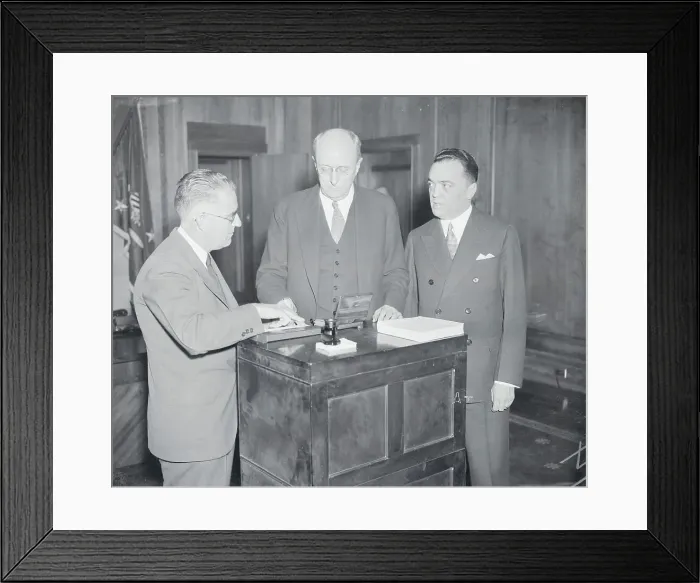 Framed Print : Homer Cummings Getting Fingerprinted Framed Print : Homer Cummings Getting Fingerprinted