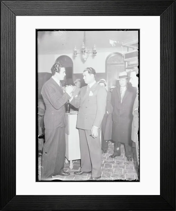 Framed Print : Jack Dempsey Holding Hand of Visiting Boxer Jack Doyle Framed Print : Jack Dempsey Holding Hand of Visiting Boxer Jack Doyle