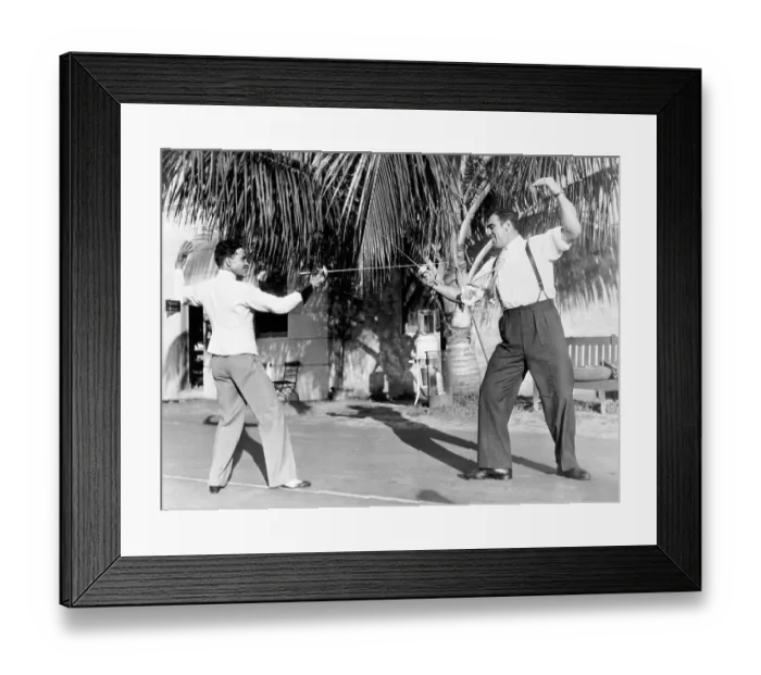 Framed Print : Primo Carnera Fencing With a Friend Framed Print : Primo Carnera Fencing With a Friend