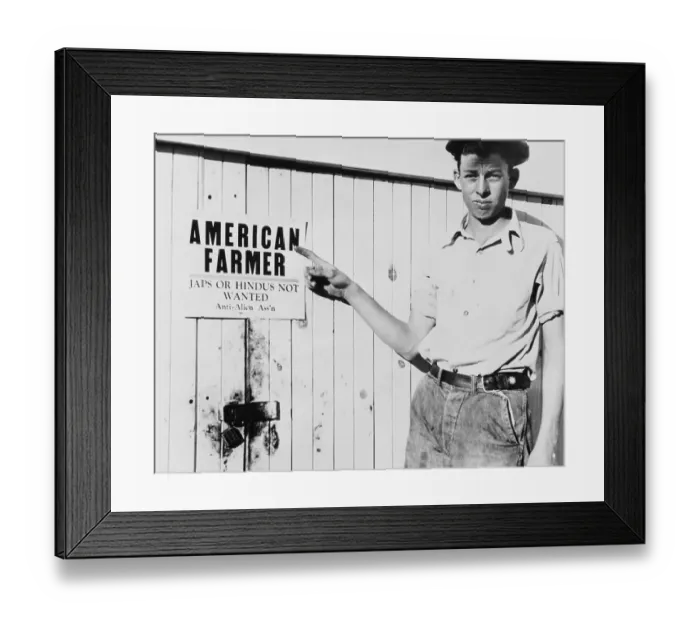 Framed Print : Man Points To Sign Framed Print : Man Points To Sign