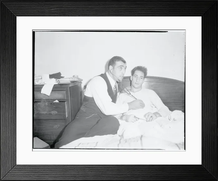 Framed Print : Primo Carnera Holding Stethoscope to Art Lasky Framed Print : Primo Carnera Holding Stethoscope to Art Lasky