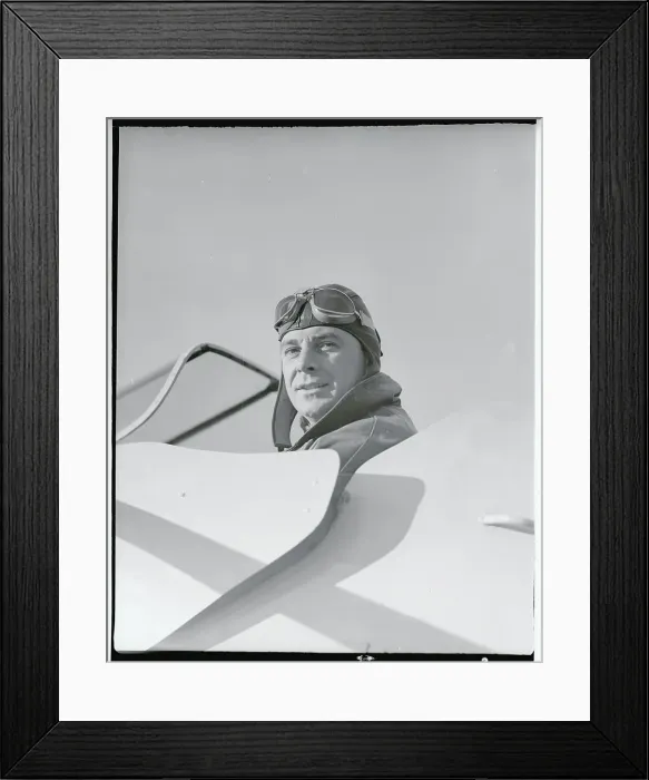 Framed Print : George Brent Sitting in an Airplane Framed Print : George Brent Sitting in an Airplane