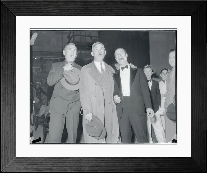 Framed Print : Will Rogers Standing With Colleagues Framed Print : Will Rogers Standing With Colleagues