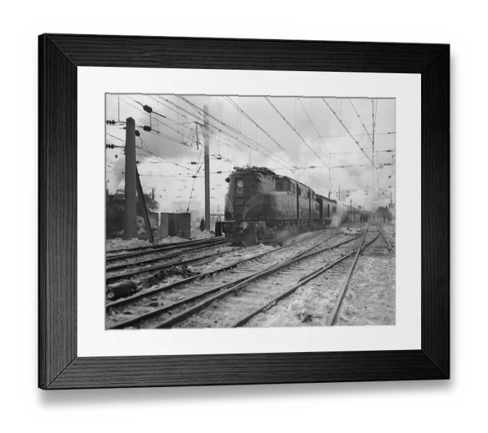 Framed Print : A Train Riding Along an Electric Railroad Framed Print : A Train Riding Along an Electric Railroad