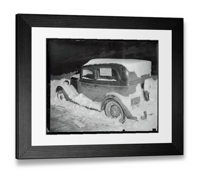 Framed Print : Automobile Sitting in the Snow