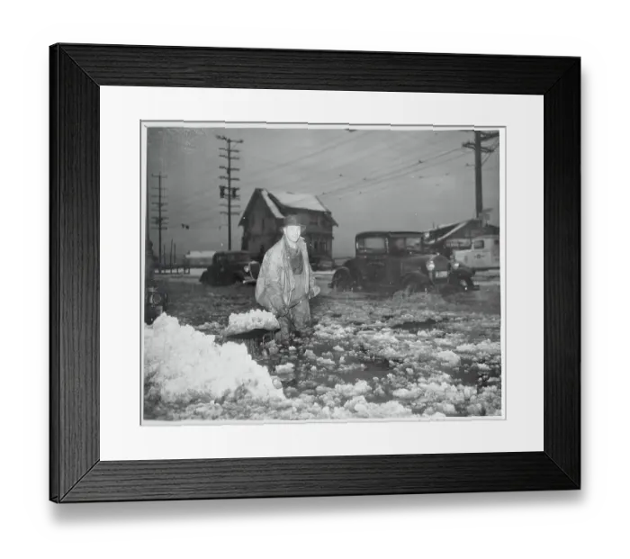 Framed Print : Man Trying to Find Clogged Storm Drain Framed Print : Man Trying to Find Clogged Storm Drain