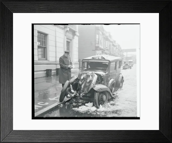 Framed Print : Policeman Inspecting a Wrecked Car Framed Print : Policeman Inspecting a Wrecked Car