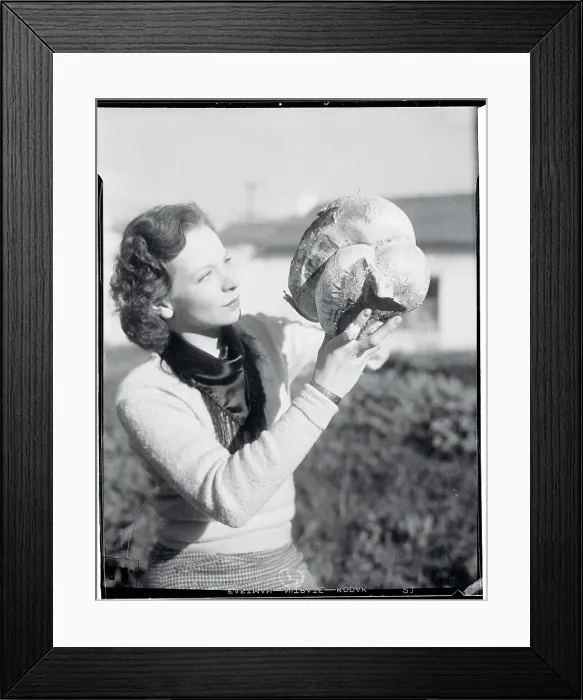 Framed Print : Botany Student Examining Gigantic Mushroom Framed Print : Botany Student Examining Gigantic Mushroom