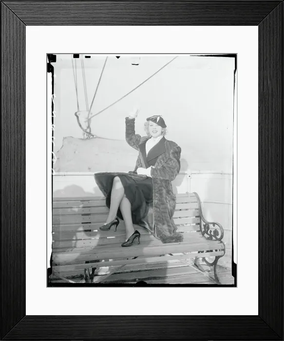 Framed Print : Actress Ida Lupino Posing on Bench Framed Print : Actress Ida Lupino Posing on Bench