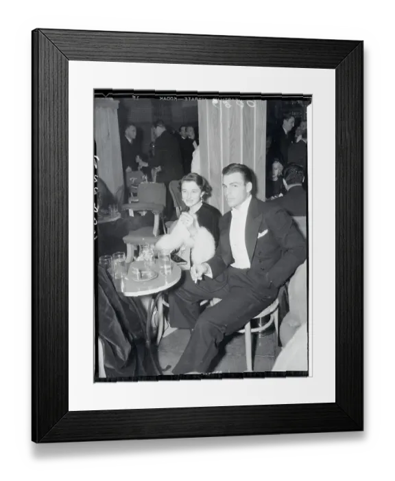 Framed Print : Athlete and Actor Buster Crabbe Sitting With His Wife in Club Framed Print : Athlete and Actor Buster Crabbe Sitting With His Wife in Club