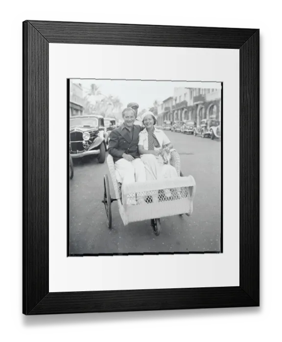 Framed Print : Mr. and Mrs.George Jessel Sitting in a Beach Chair Framed Print : Mr. and Mrs.George Jessel Sitting in a Beach Chair