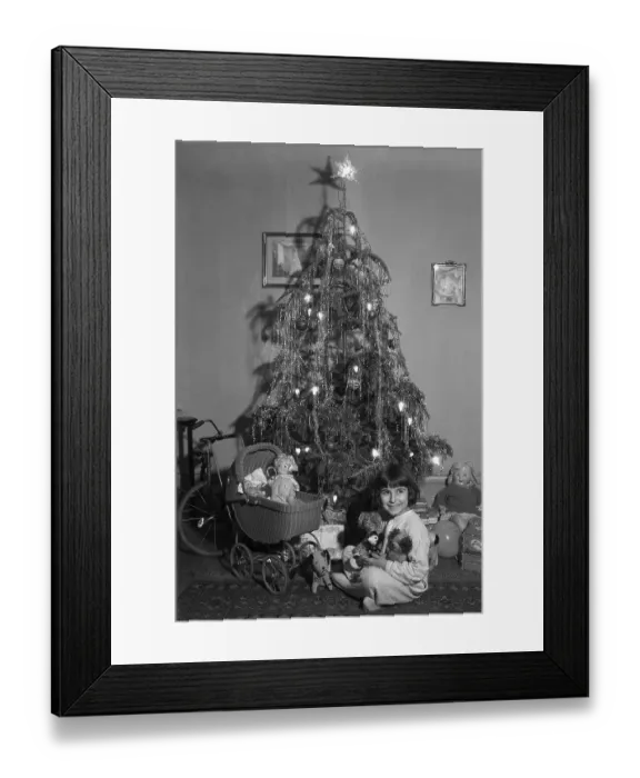 Framed Print : Girl and Toys Underneath Christmas Tree Framed Print : Girl and Toys Underneath Christmas Tree