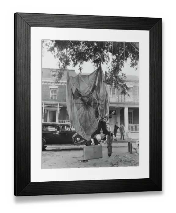 Framed Print : Actor Harold Lloyd Hanging from a Parachute Outdoors Framed Print : Actor Harold Lloyd Hanging from a Parachute Outdoors