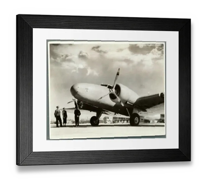 Framed Print : Airline Employees Standing Below Airplane Framed Print : Airline Employees Standing Below Airplane