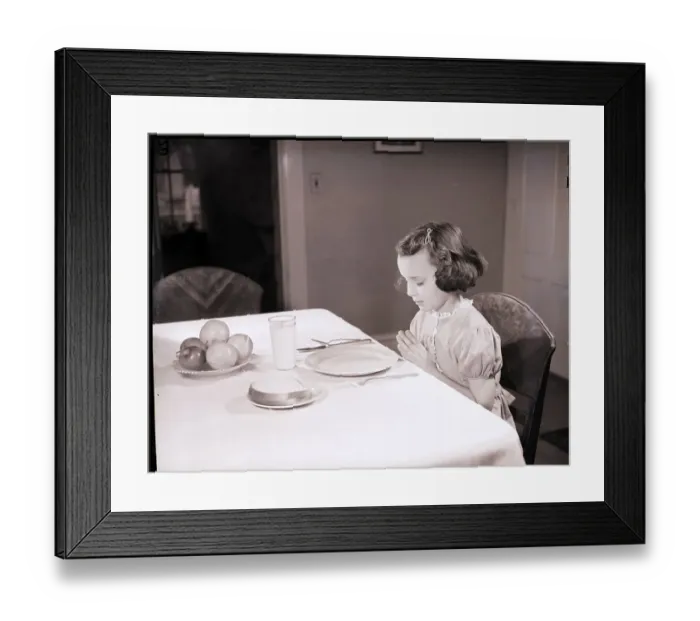 Framed Print : Girl Praying at Table Framed Print : Girl Praying at Table