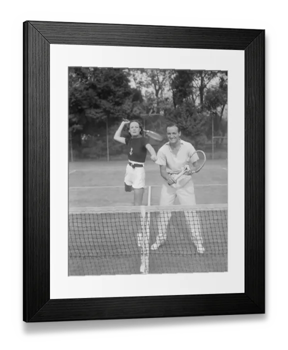 Framed Print : Wendy Barrie and David Niven Playing Tennis Framed Print : Wendy Barrie and David Niven Playing Tennis