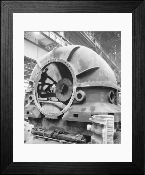 Framed Print : Workman Standing Inside of an Exhaust Shell Framed Print : Workman Standing Inside of an Exhaust Shell