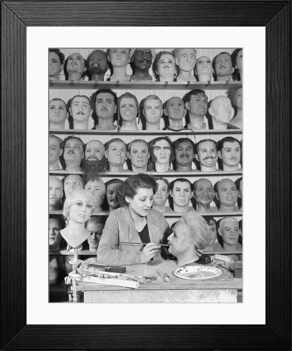 Framed Print : Waxwork Artist with Heads Framed Print : Waxwork Artist with Heads