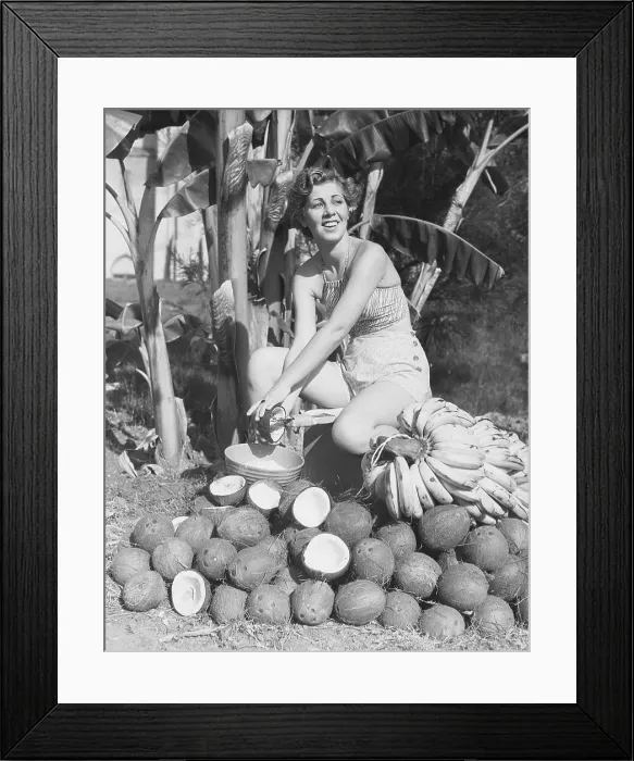 Framed Print : Woman Shredding Coconut with Traditional Shredder Framed Print : Woman Shredding Coconut with Traditional Shredder