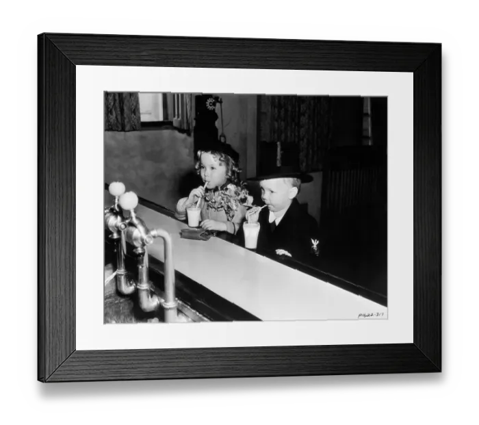 Framed Print : Baby Leroy and Shirely Temple Drink Milk