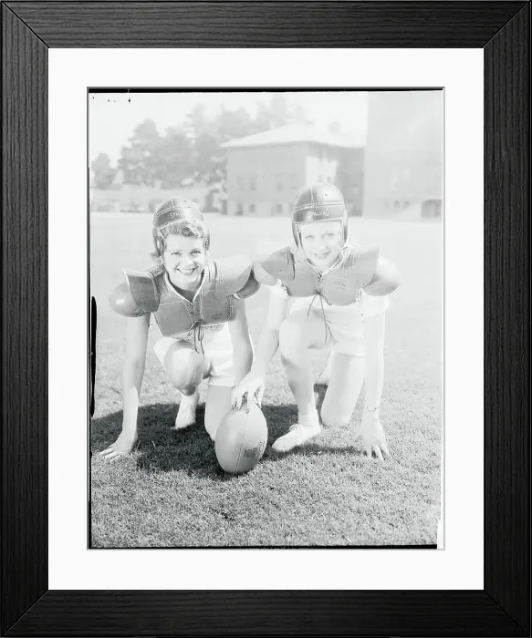 Framed Print : Younger Lucille Ball and Friend Kneeling With Football Framed Print : Younger Lucille Ball and Friend Kneeling With Football