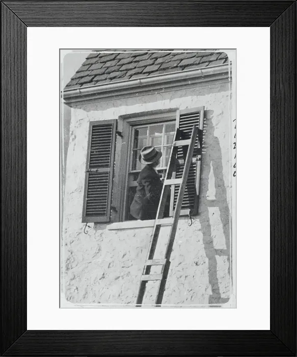 Framed Print : Man Looking Out a Window Framed Print : Man Looking Out a Window
