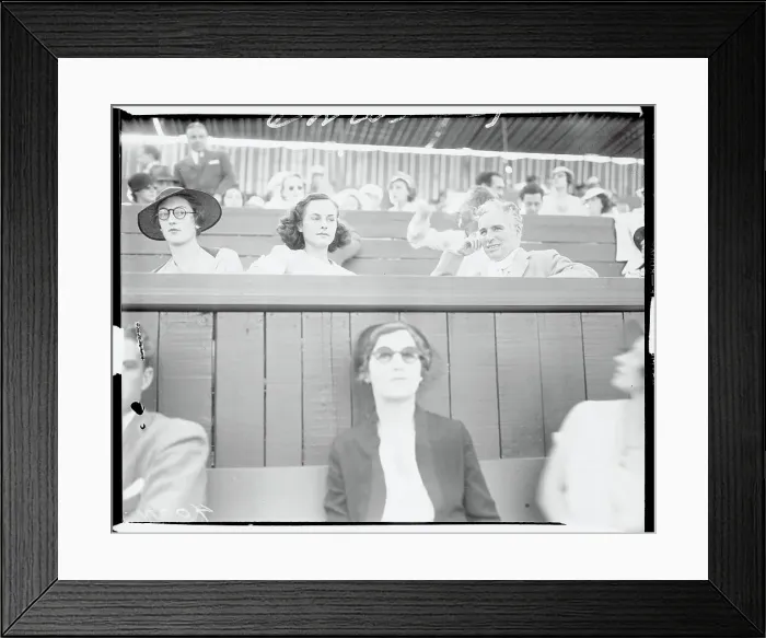 Framed Print : Charlie Chaplin and Paulette Goddard Watching a Tennis Match Framed Print : Charlie Chaplin and Paulette Goddard Watching a Tennis Match