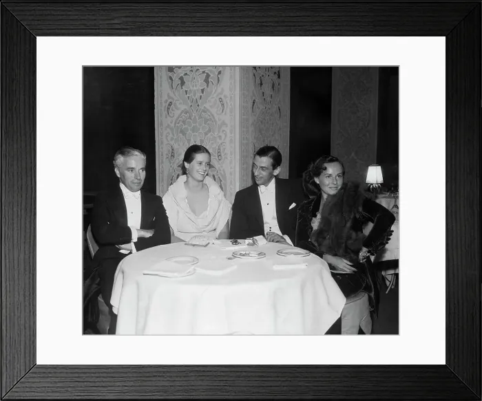 Framed Print : Charlie Chaplin Chatting with Colleagues Framed Print : Charlie Chaplin Chatting with Colleagues