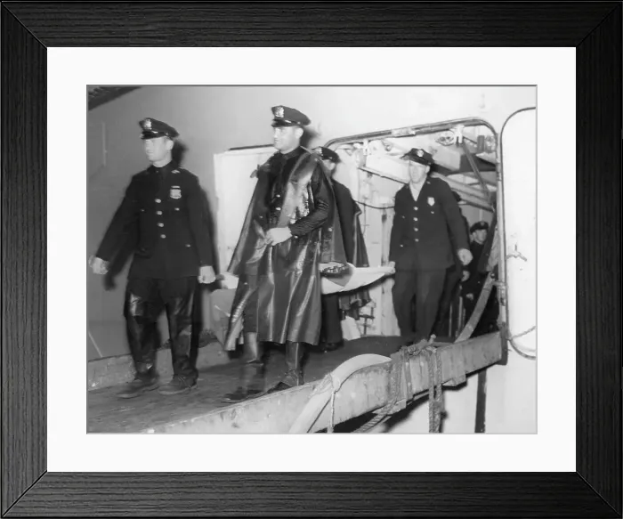 Framed Print : Survivor Carried On Stretcher