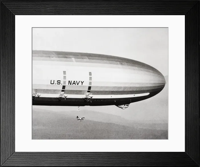 Framed Print : Plane Underneath Huge Dirigible in Flight Framed Print : Plane Underneath Huge Dirigible in Flight