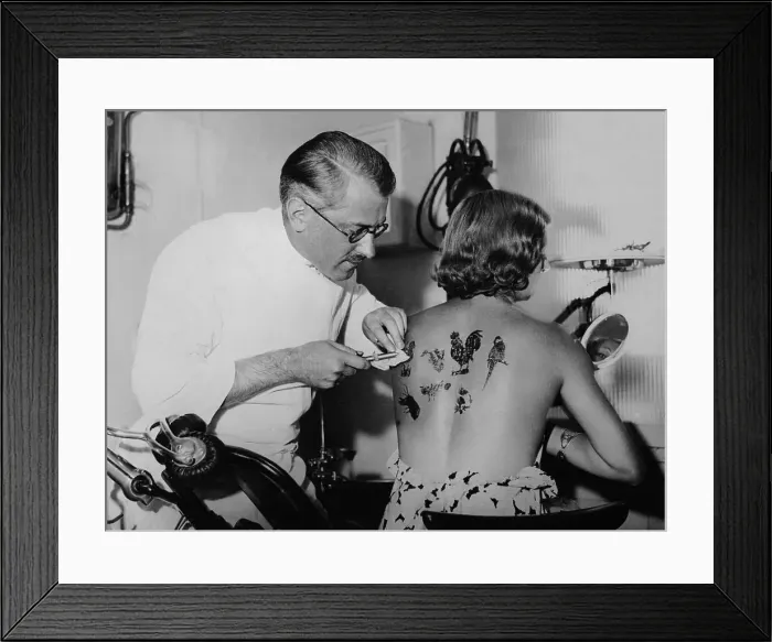 Framed Print : Woman Getting Tattooed Framed Print : Woman Getting Tattooed