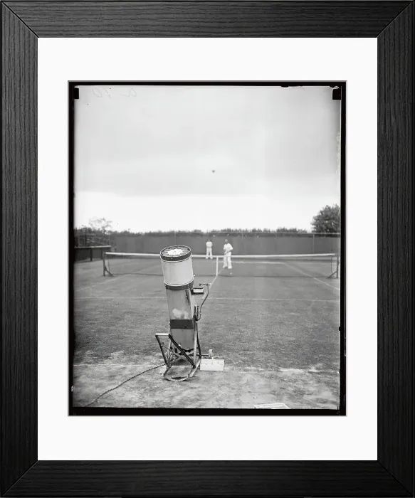 Framed Print : Tennis Robot Serving Balls Framed Print : Tennis Robot Serving Balls