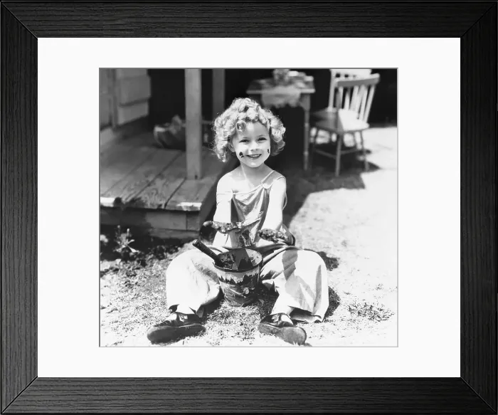 Framed Print : Actress Shirley Temple Playing in the Mud Framed Print : Actress Shirley Temple Playing in the Mud