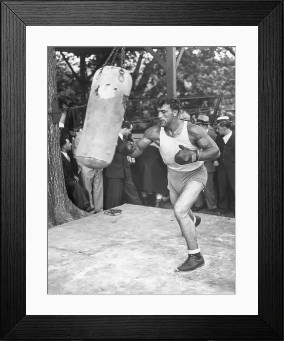 Framed Print : Primo Carnera Hitting Punching Bag Framed Print : Primo Carnera Hitting Punching Bag