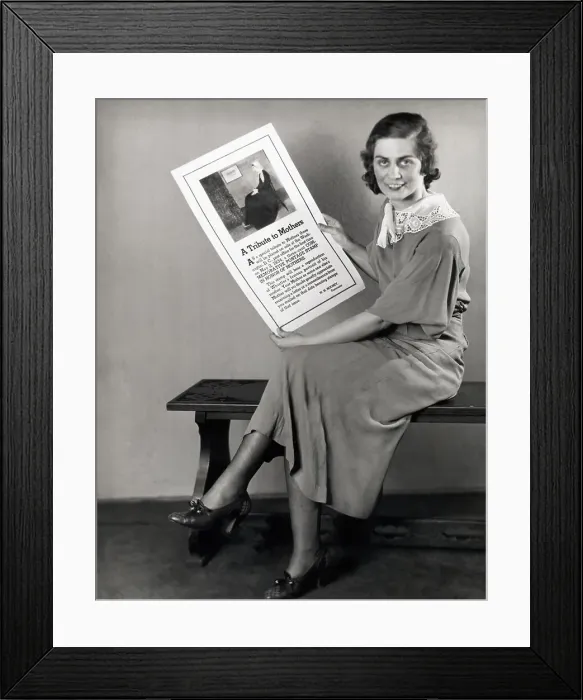 Framed Print : Woman with Poster for Mothers Day Framed Print : Woman with Poster for Mothers Day