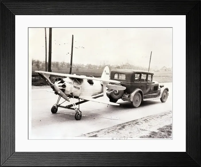 Framed Print : Automobile Towing Small Airplane Framed Print : Automobile Towing Small Airplane