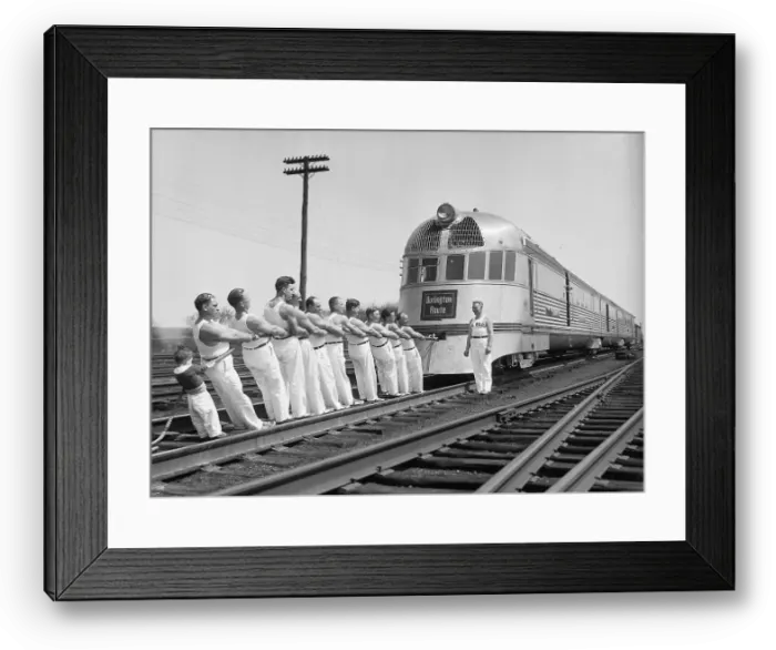 Framed Print : Tug-Of-War Team Pulls Train Framed Print : Tug-Of-War Team Pulls Train