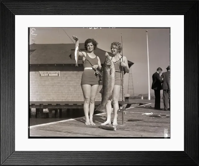 Framed Print : Women Holding Fish on Pier Framed Print : Women Holding Fish on Pier