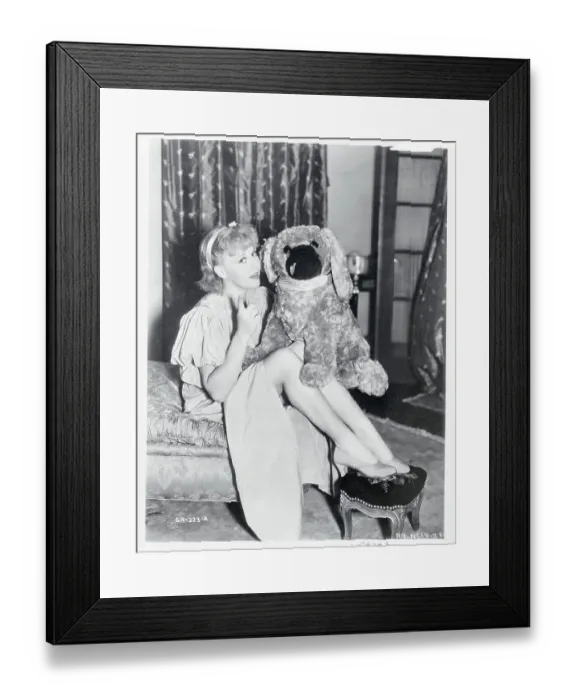 Framed Print : Ginger Rogers Holding a Stuffed Animal Framed Print : Ginger Rogers Holding a Stuffed Animal