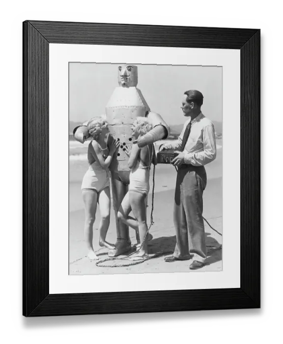 Framed Print : Women and Inventor with Robot at Beach Framed Print : Women and Inventor with Robot at Beach