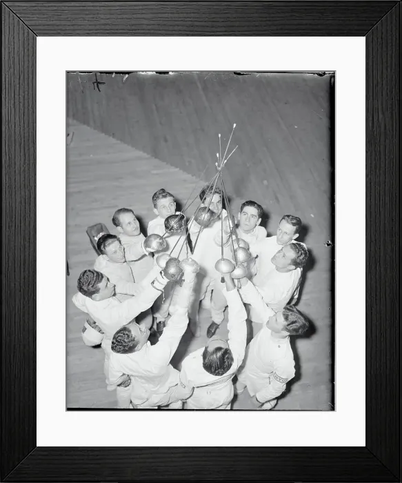 Framed Print : Fencing Teammates Holding Up Their Foils