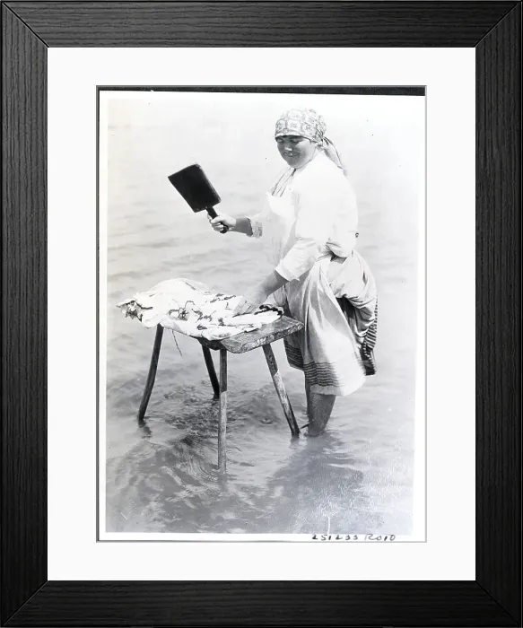 Framed Print : Woman Cleaning Clothes in River Framed Print : Woman Cleaning Clothes in River