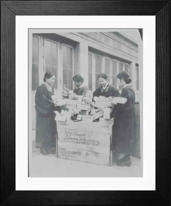 Framed Print : Red Cross Workers Preparing Toy Collection for Disbursement Framed Print : Red Cross Workers Preparing Toy Collection for Disbursement