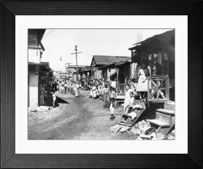 Framed Print : Poor Families on La Perla Street Framed Print : Poor Families on La Perla Street