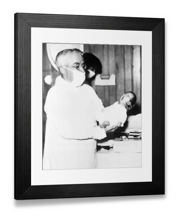 Framed Print : Allan Dafoe Checking Yvonne Dionee Framed Print : Allan Dafoe Checking Yvonne Dionee