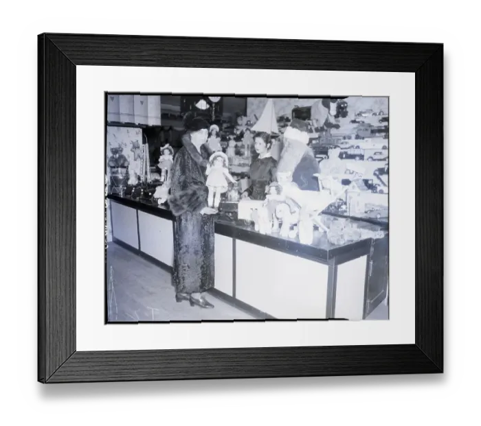 Framed Print : Eleanor Roosevelt with Santa and Doll at Sales Counter Framed Print : Eleanor Roosevelt with Santa and Doll at Sales Counter