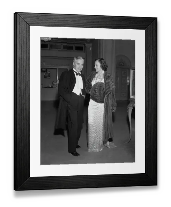 Framed Print : Charlie Chaplin and Paulette Goddard