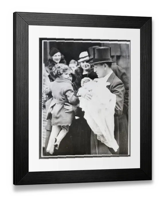 Framed Print : Noel Coward Holding Baby Framed Print : Noel Coward Holding Baby